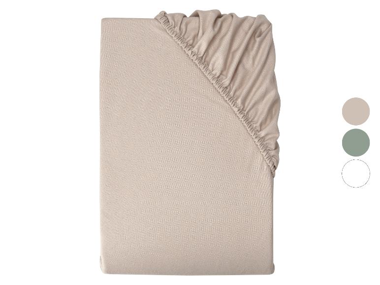 Drap-housse beige avec échantillons de couleurs