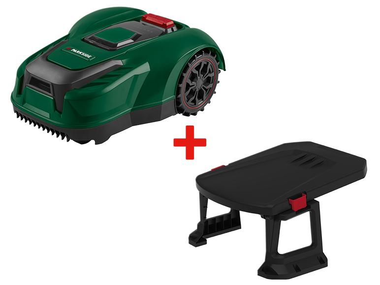 Tondeuse robot verte et noire avec une station de charge noire.