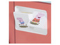 Autocollants Peppa Pig sur une surface rose.