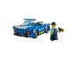 Voiture de police LEGO et figurine de policier.