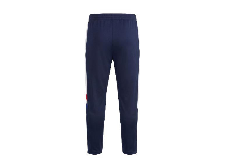 Pantalon de survêtement bleu marine avec des rayures blanches, rouges et bleues sur les côtés.