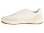 Des baskets blanches avec des détails beiges.