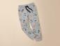 Pantalon de jogging gris avec imprimé de dinosaures pour enfants.