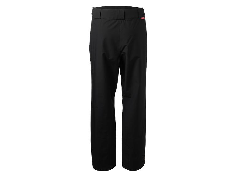 Pantalon de ski noir avec une étiquette rouge à la taille.