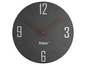 Une horloge murale noire Mebus avec des chiffres romains.