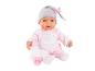 Poupée bébé en pyjama rose avec biberon et sucette