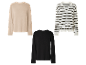 Trois pulls en maille : beige, blanc et noir rayé, et noir.