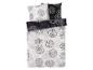 Une housse de couette blanche avec des cercles noirs.