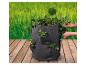 Un pot noir avec plusieurs poches pour planter des fraises.