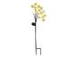 Lampe solaire de jardin en forme de fleurs jaunes et blanches.