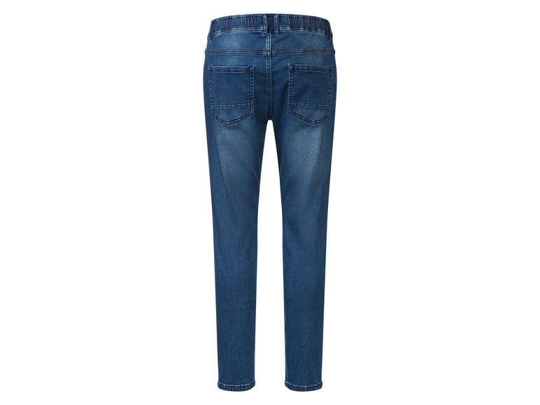 Un jean bleu avec une ceinture élastique.