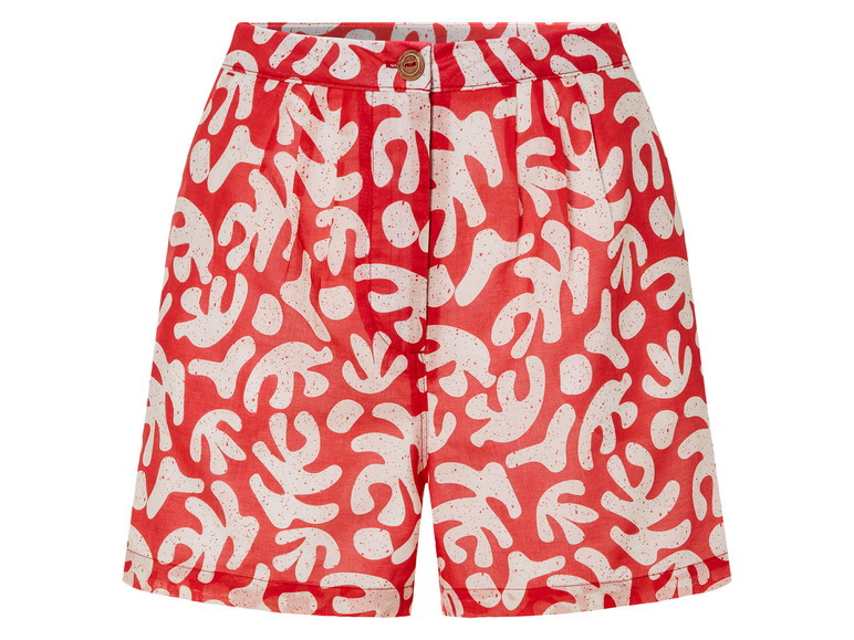 Shorts rouges avec un motif blanc abstrait.
