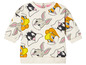 Un t-shirt blanc avec Bugs Bunny et d'autres personnages de Looney Tunes.