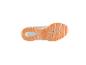 Semelle de baskets beige avec détails orange.