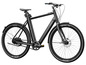 Un vélo électrique noir avec des pneus Kenda.