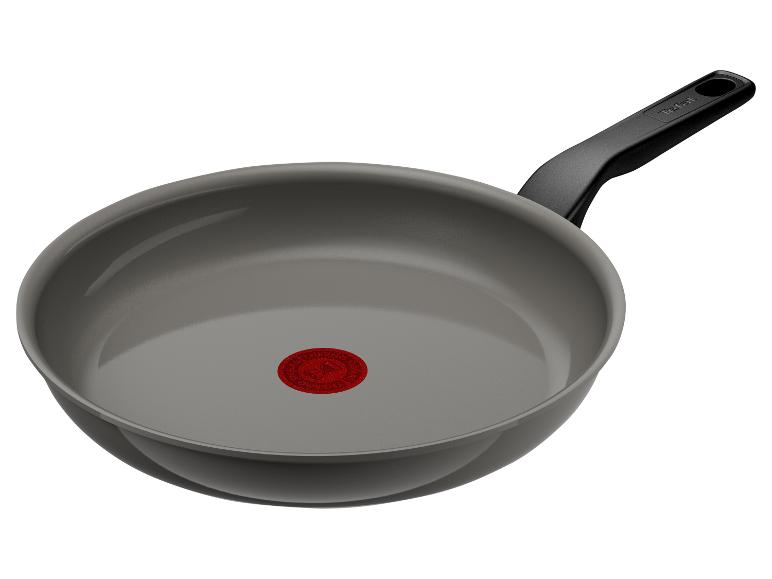 Poêle à frire Tefal grise avec poignée noire et indicateur de chaleur rouge