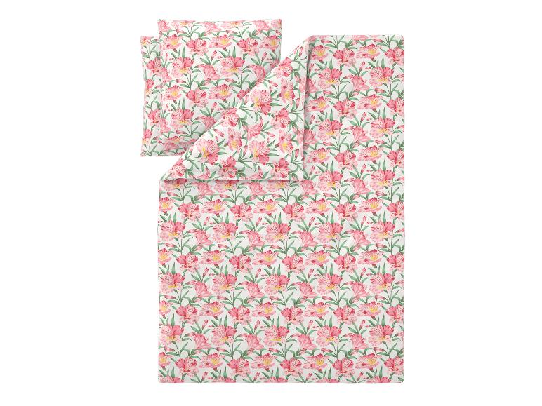 Parure de lit à motif floral rose.