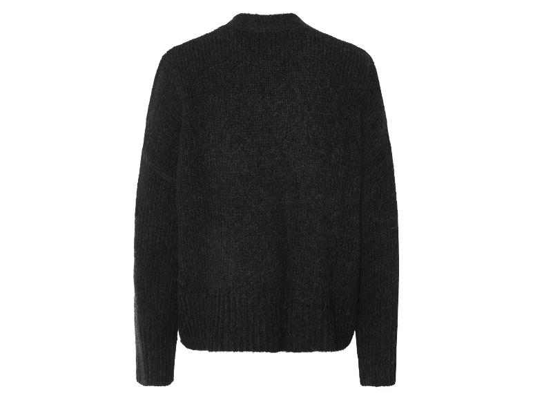 Pull noir en grosse maille.