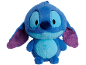 Peluche alien bleu avec de grandes oreilles et des yeux.