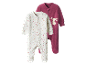 Deux pyjamas bébé, un à pois et un avec un lapin.