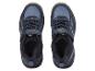 Une paire de chaussures de sport bleues avec fermeture velcro et lacets.