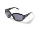 Lunettes de soleil noires avec des clous décoratifs sur la monture.