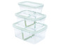 Trois boîtes de rangement en verre avec des couvercles verts