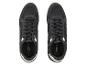 Deux paires de baskets noires Esmara avec des détails blancs.