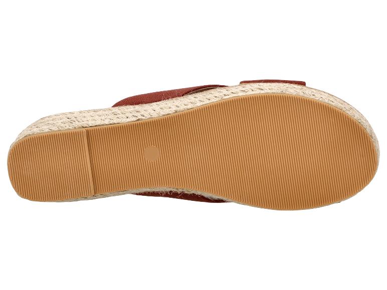 Semelle d'espadrille couleur rouille avec plateforme en jute tressée.