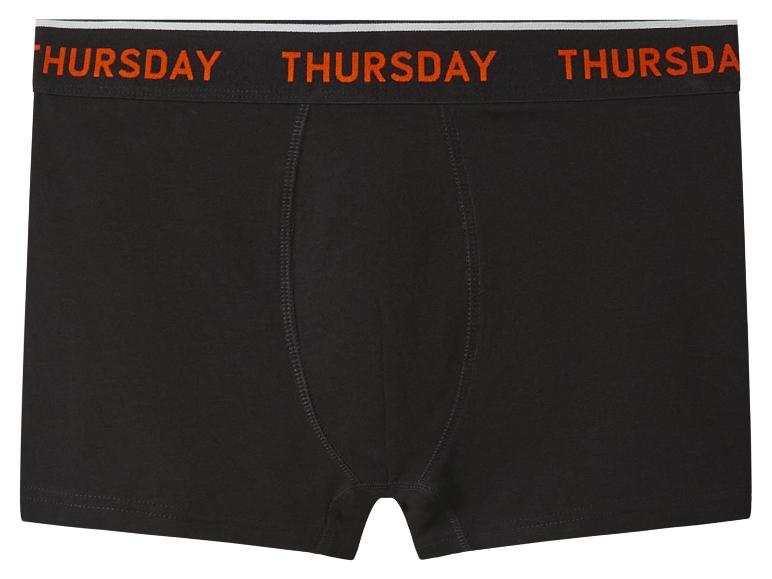 Caleçon noir pour homme avec inscription orange 'THURSDAY' sur la ceinture.