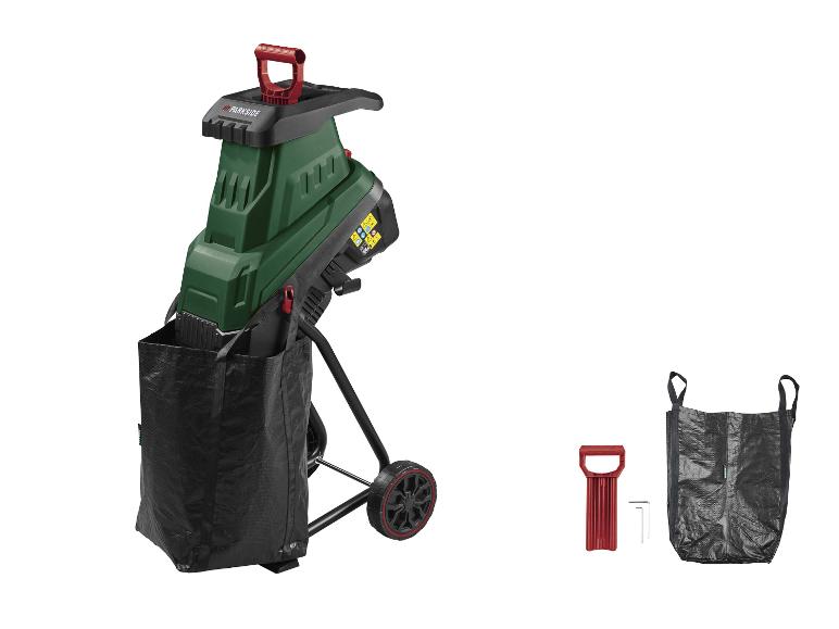 Broyeur de jardin avec sac de collecte noir, poussoir rouge et outils.