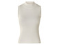 Pull blanc sans manches à col roulé.