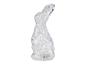 Une figurine de lapin en verre avec une surface texturée.