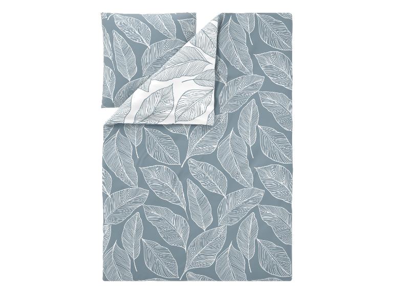 Parure de lit housse de couette et taie d'oreiller avec motif de feuilles blanches sur fond bleu-gris.