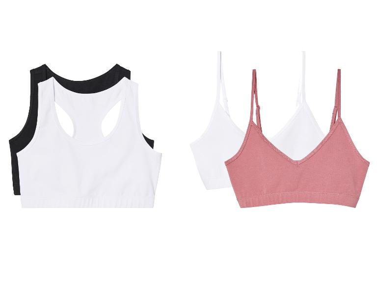 Soutiens-gorge de sport et camisoles bicolores.