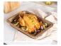 Poulet rôti avec des légumes dans un plat à four.