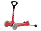 Une trottinette Playtive rouge avec quatre roues.