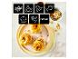 Pommes au four avec diverses icônes de cuisson : frites, poulet, légumes, poisson, cupcake, fruits, manuel.