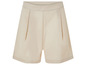 Shorts beiges à plis.