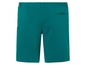 Short de couleur turquoise avec une taille élastique.
