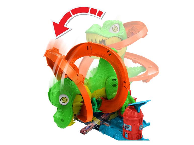 Coffret Hot Wheels T-Rex Chomp Down avec un dinosaure vert et une piste de course orange.