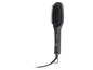 Une brosse à cheveux noire avec un cordon.