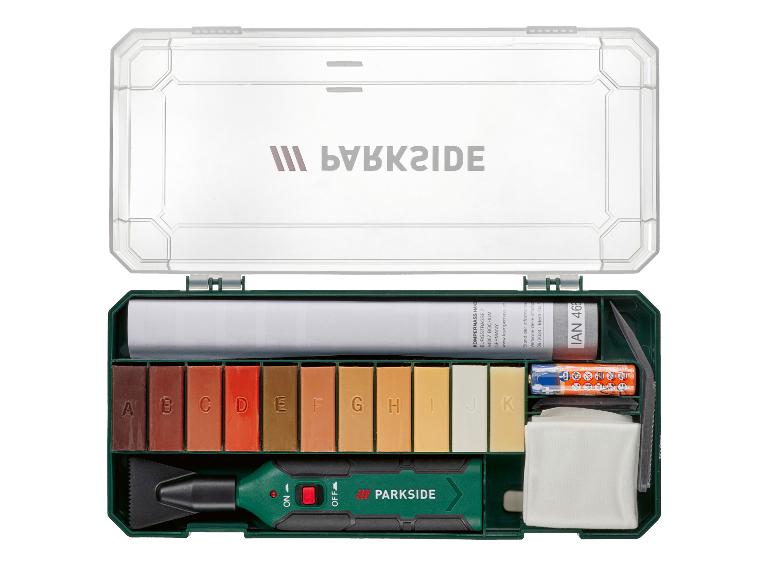 Kit de réparation bois PARKSIDE avec cires colorées, outil de fusion et accessoires.