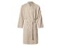 Peignoir gaufré beige avec ceinture à nouer et poches.