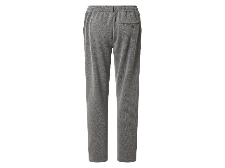 Pantalon de jogging gris pour homme avec taille élastique et poche arrière boutonnée.