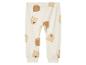 Pantalon beige à imprimé ours pour bébé.