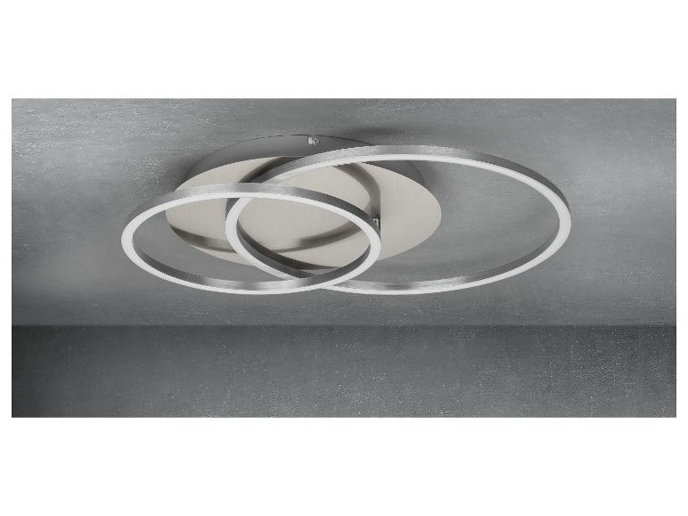 Un luminaire de plafond moderne aux formes rondes.