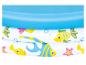 Piscine gonflable pour enfants, décor poissons et étoiles de mer.