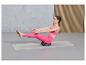 Femme faisant de l'exercice sur un tapis de yoga avec un coussin d'équilibre.