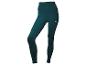Leggings de couleur vert foncé pour faire du sport.